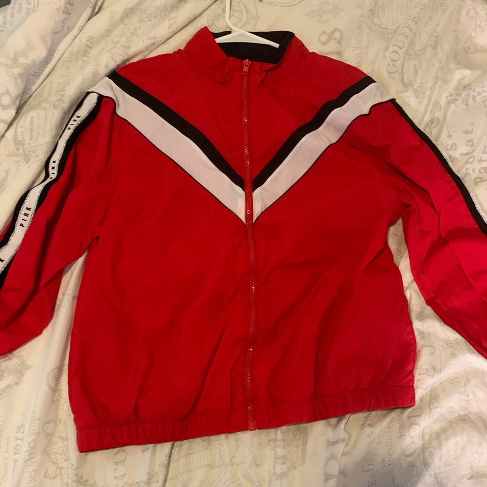 Pink nation red windbreaker.